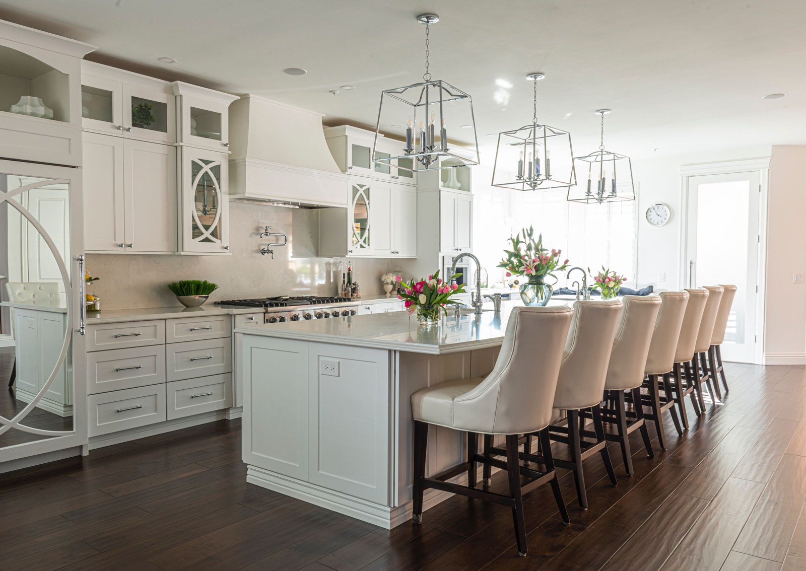 Bright kitchen with an island and carefully coordinated cabinetry